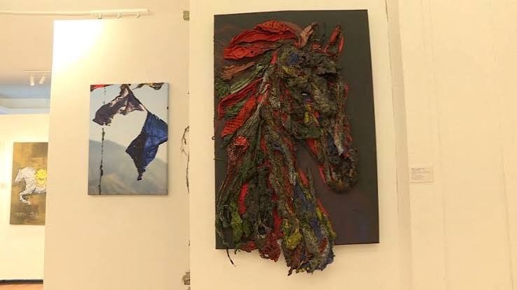 Bhutanese Artist Kunzang Wangmo Showcases Intergenerational Connection by Pairing Her Paintings with 83-Year-Old Mother-in-Law’s Handwoven Kira